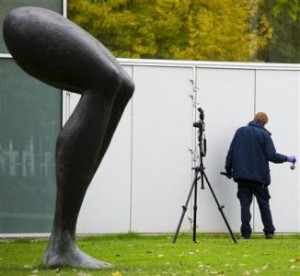 Police officer investigates the surroundings of Rotterdam's Kunsthal art gallery in the Netherlands