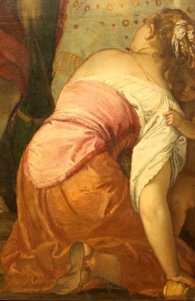La "donna inginocchiata col bimbo" ne "La Predica del Battista"
