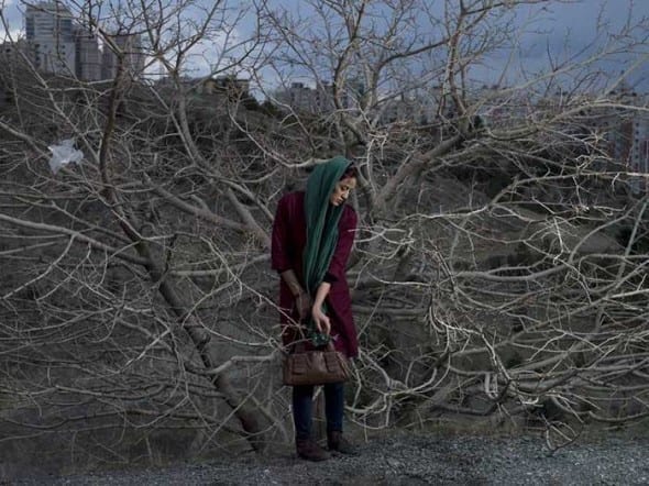 A portrait of Somayyeh, a 32-year old divorced teacher in Iran. Photo: © Newsha Tavakolian for the Carmignac Gestion Photojournalism Award