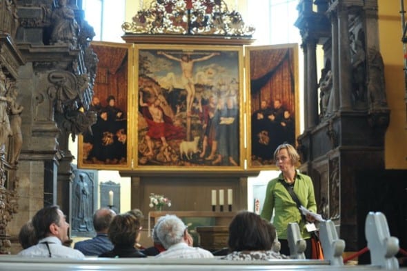 Cranach Altar (1555) pictured during a service at the Weimarer Stadtkirche in Weimar, Germany