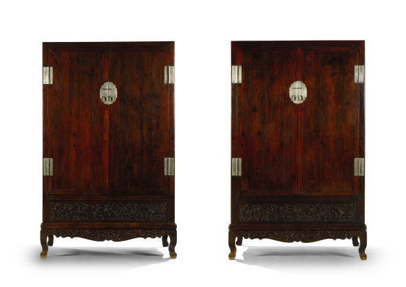 Lot 4 A Fine Pair of Huanghuali Square-Corner Cupboards on stands, Ligui 17th/18th Century Estimate £150,000-250,000 Sold for £1,445,000 / US2,192,788 / HK$17,103,746