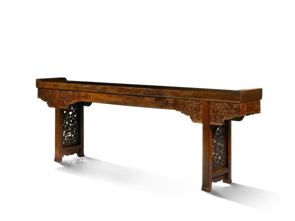 Lot 8 A Large Huanghuali Solid Top Altar Table, Qiaotouan 17th/18th Century Estimate £150,000-250,000 Sold for £1,805,000 / US$2,739,088 / HK$21,364,886