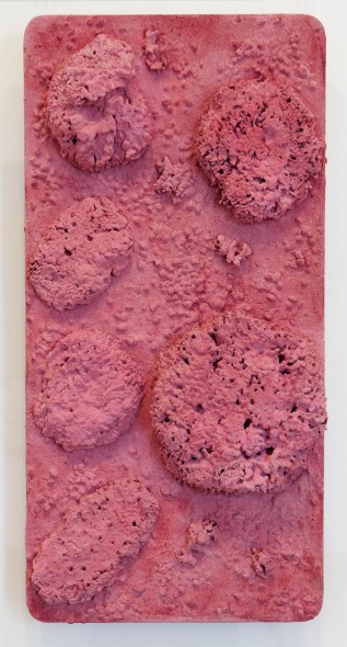Yves Klein, 1928-1962 Untitled Pink Sponge-relief, (RE 44) c.1960 Dry pigment and synthetic resin, pebbles, natural sponges on panel 650 x 320 mm   © Yves Klein, ADAGP, Paris / DACS, London, 2016. Carré d'Art-Musée d'art contemporain de Nîmes. Photo David Huguenin