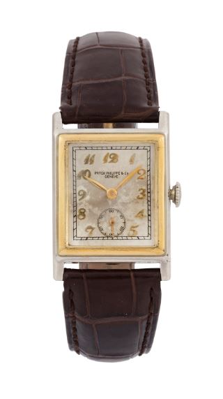 Lotto 114 (176507) PATEK PHILIPPE, Geneve, movement no. 820313, case No. 607607. Raro, orologio da polso, di forma rettangolare, in oro giallo 18K e oro bianco con fibbia in oro. Accompagnato dalla scatola originale ed Estratto degli Archivi. Realizzato nel 1928 circa € 15.000 - 22.000