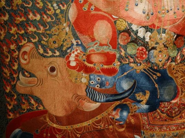 A HIGHLY IMPORTANT IMPERIAL EMBROIDERED SILK THANGKA