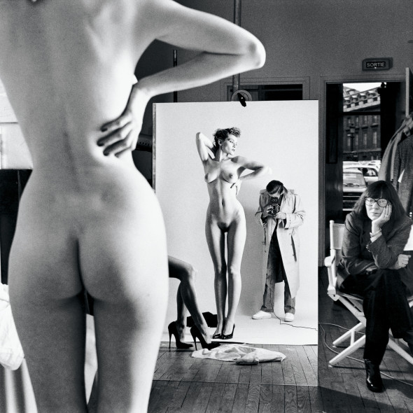 Helmut Newton Self-Portrait with Wife and Models Vogue Studio, Paris 1981 © Helmut Newton Estate