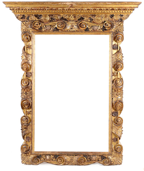 Cornice a cassetta di ampia fascia intagliata ed interamente dorata, Emilia XVI secolo decori a rilievo a motivo flogliaceo, cm 40,5x25 (75x61) € 8.000 - 10.000