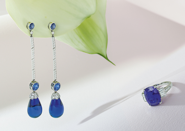Pair of Tanzanite and Diamond Earrings, Tiffany & Co. Each earring set with two round tanzanites and a line of round diamonds, supporting two tanzanite drops capped by round diamonds, signed T & Co Estimate  18,000 — 22,000  USD Tanzanite and Diamond Ring, Tiffany & Co. Set with a cushion-cut tanzanite weighing 6.65 carats, accented by bullet-shaped and round diamonds, size 6, signed Tiffany & Co., numbered 23981424. With signed box. Estimate  5,000 — 7,000  USD