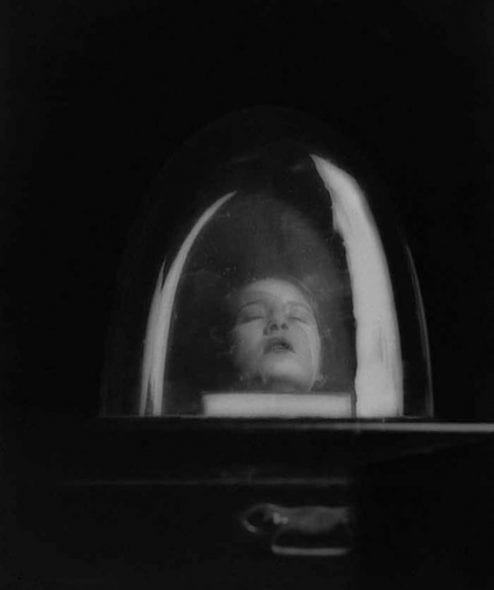 Lee Miller,Tanja Ramm under a belljar, 1930. ©Lee Miller Archives, England.