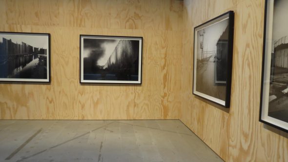 Rula Halawani, The wall, The wall at night e Untitled n.1 dalla serie Gates to Heaven stampe digitali a pigmento in bianco e nero courtesy l'Artista