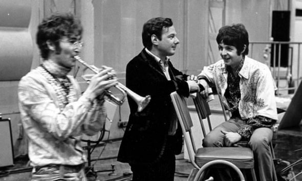 Brian Epstein, centre, with John Lennon and Paul McCartney at Abbey Road studios. Photograph: David Magnus/Rex/Shutterstock